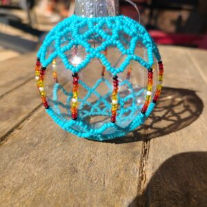 Beaded Turquoise Ornament with Fire Colors